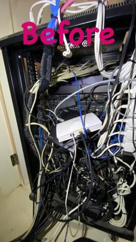 An equipment rack before our rescue work, full of tangled cables