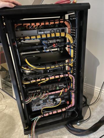 The equipment rack after we rebuilt it, with every cable dressed and tied