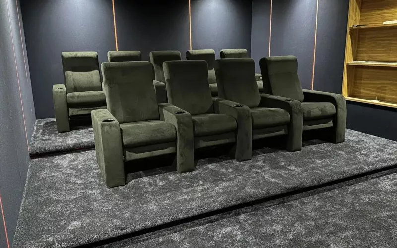 Finished home cinema installation in Berkshire: nine reclining seats on a staged floor in a Finchampstead home