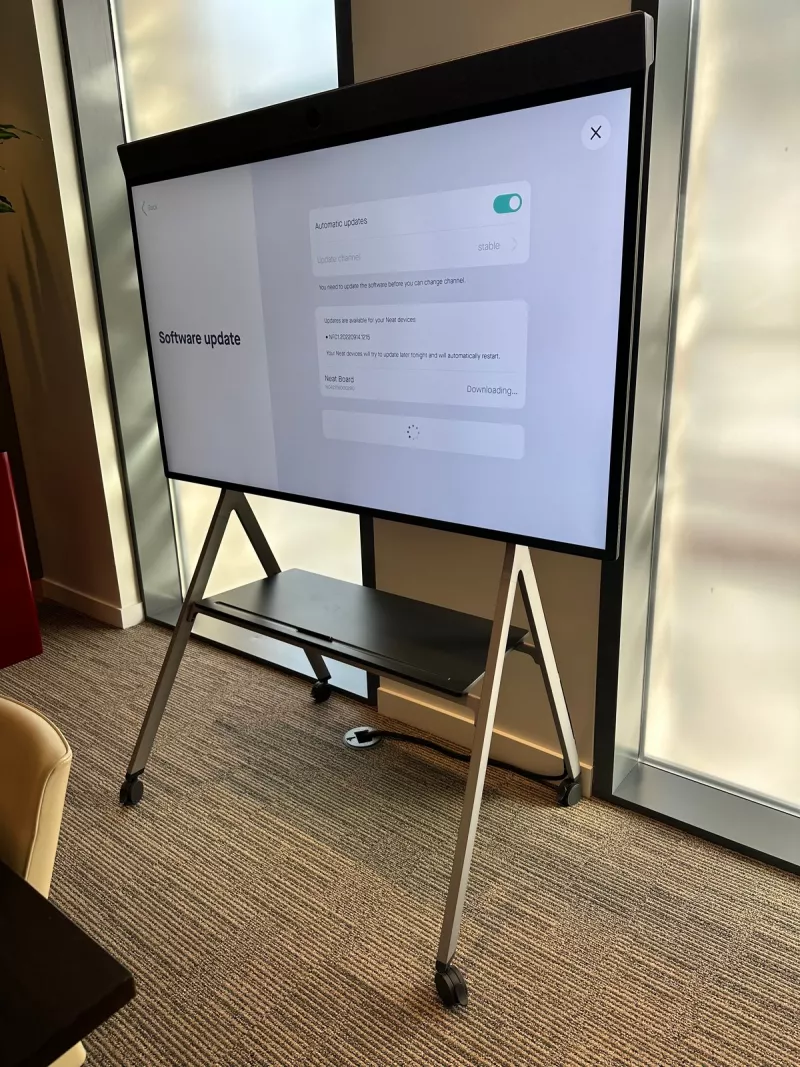 Neat Board settings page with automatic updates turned on and a software update in progress