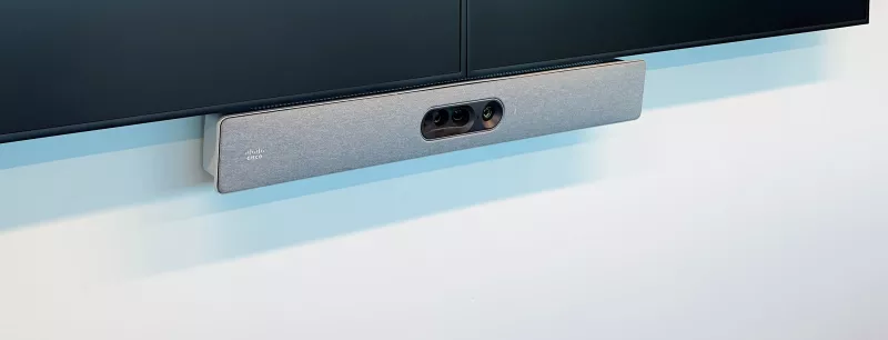 The Cisco bar in close up: its lenses sit in a dark window in the middle of a grey fabric front, with the Cisco logo at the left