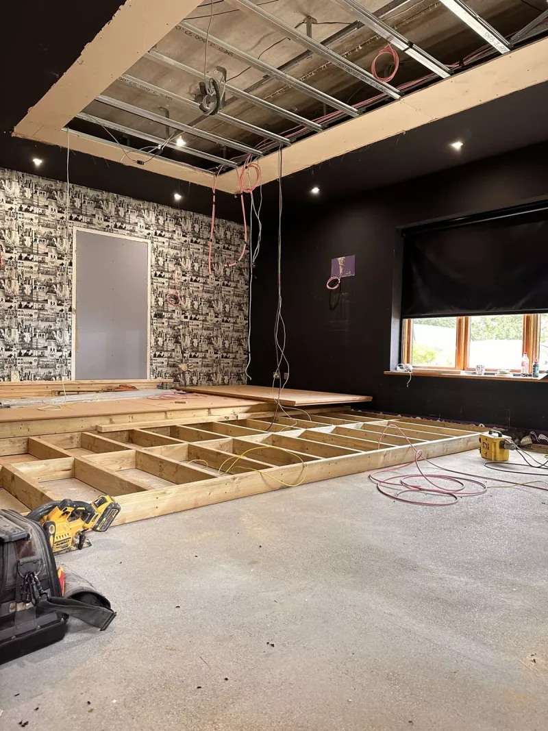 Timber frame of the staged floor going into the home cinema