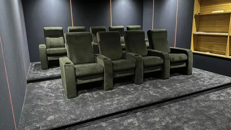 Finished home cinema installation in Berkshire: nine reclining seats on a staged floor in a Finchampstead home